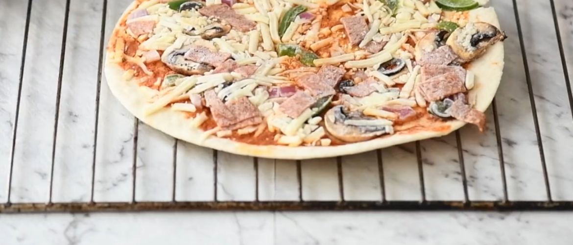 Frozen mini pizza in toaster oven